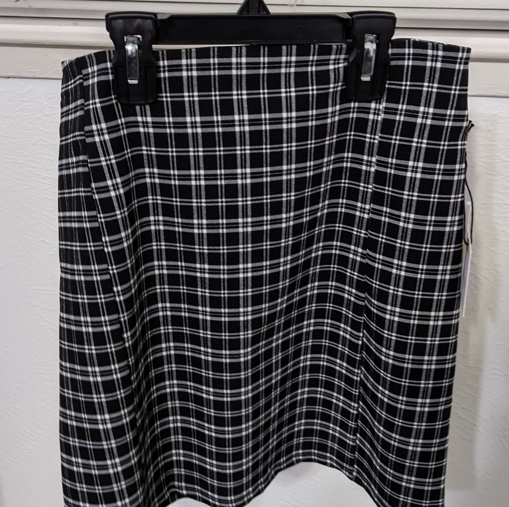 Brand new, black plaid skirt